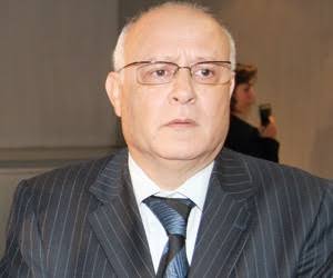 Portrait of Saïd Alj at an indoor event
